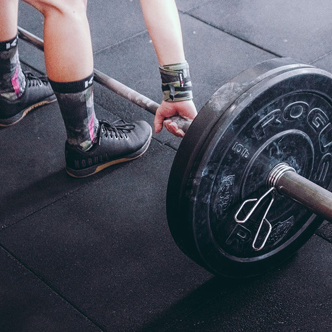 Person About to Lift Barbell Person About to Lift Barbell